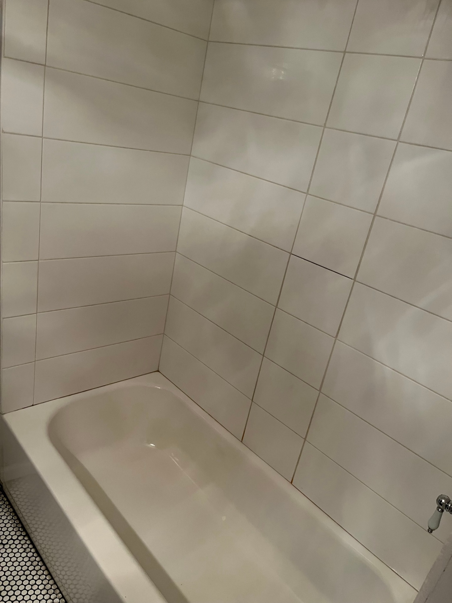 Rental bathroom tub and tile — after